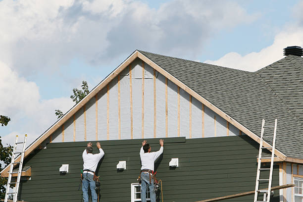 Professional Siding technician working in Stratton, OH